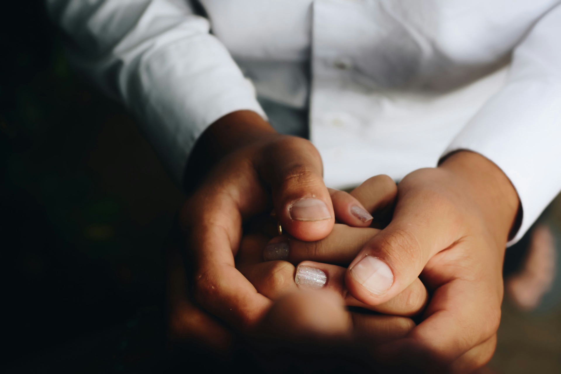 Hands joined together in support